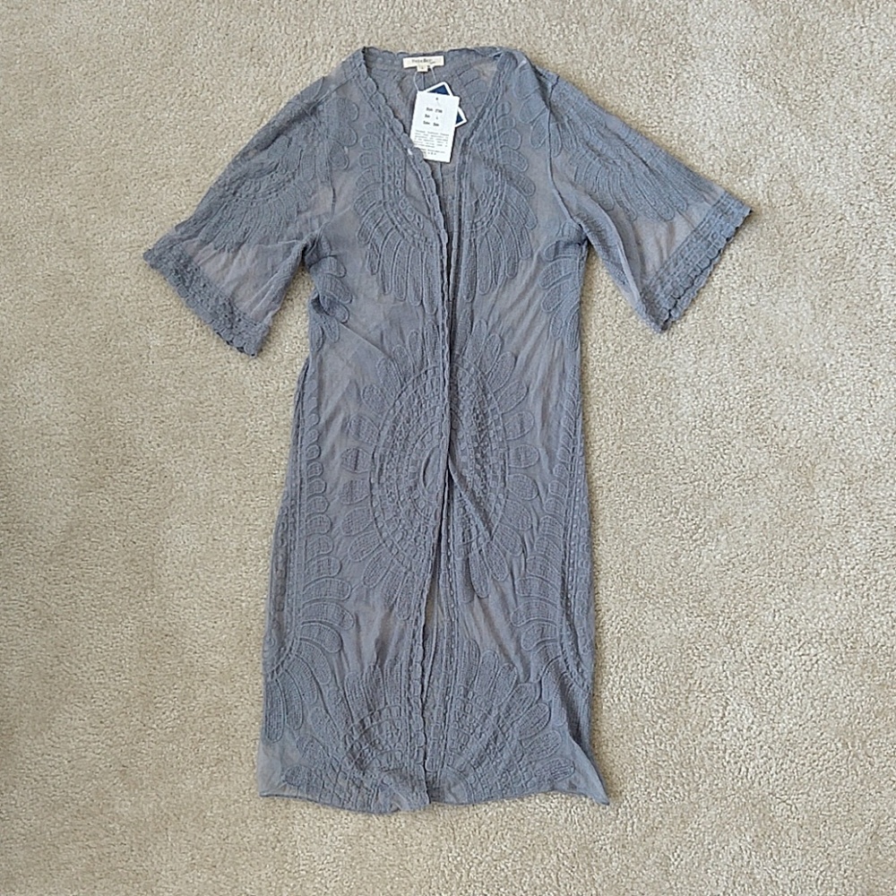Gorgeous wrap,  perfect over black dress NWT
